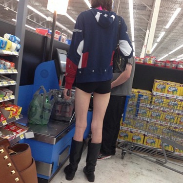 Tall Amazon Woman with Boots, Short Shorts, and Long Legs at Walmart