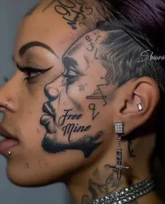 The woman got a tattoo of her man who is in prison on her face 👀.🤔