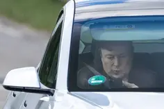 Elon Musk driving a Cybertruck in Texas.