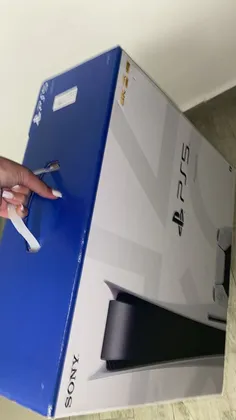 brand-new PS5 set with an additional controller and a popular launch game